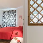 Red & White Vatican Apartment