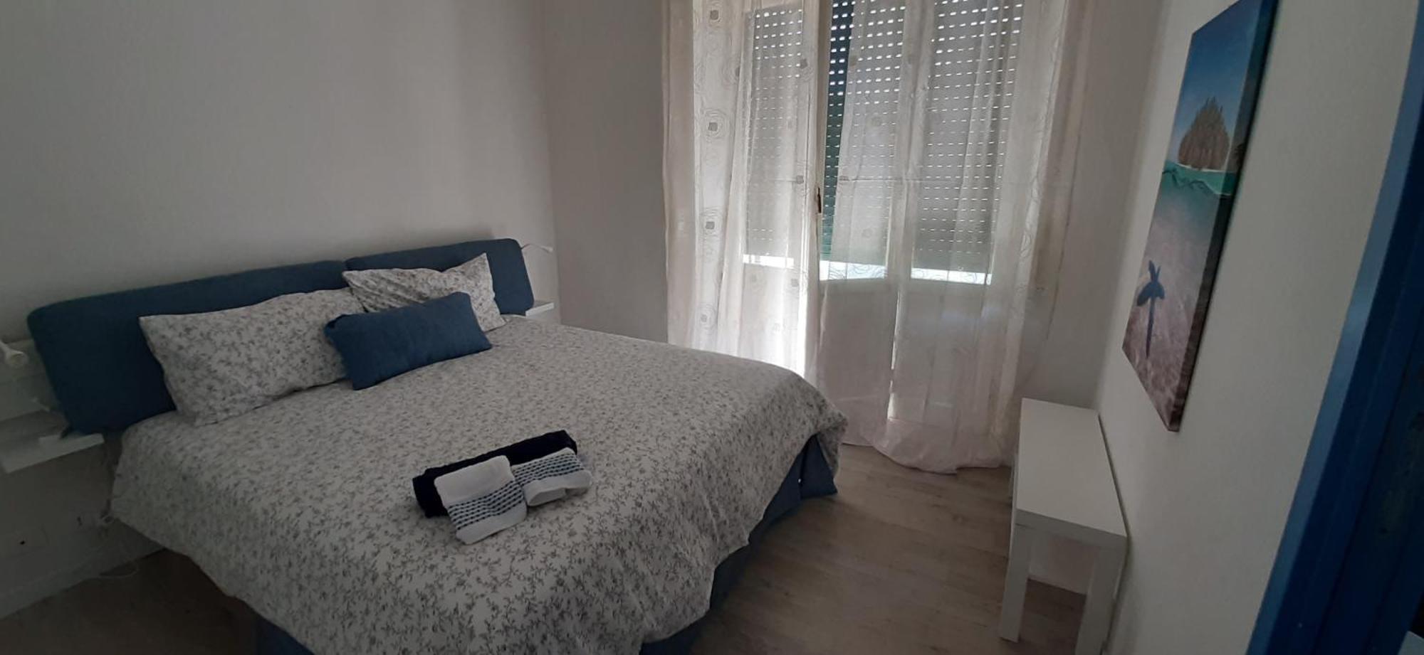 Sunny Sexy Grey & Cool Blue Apartment